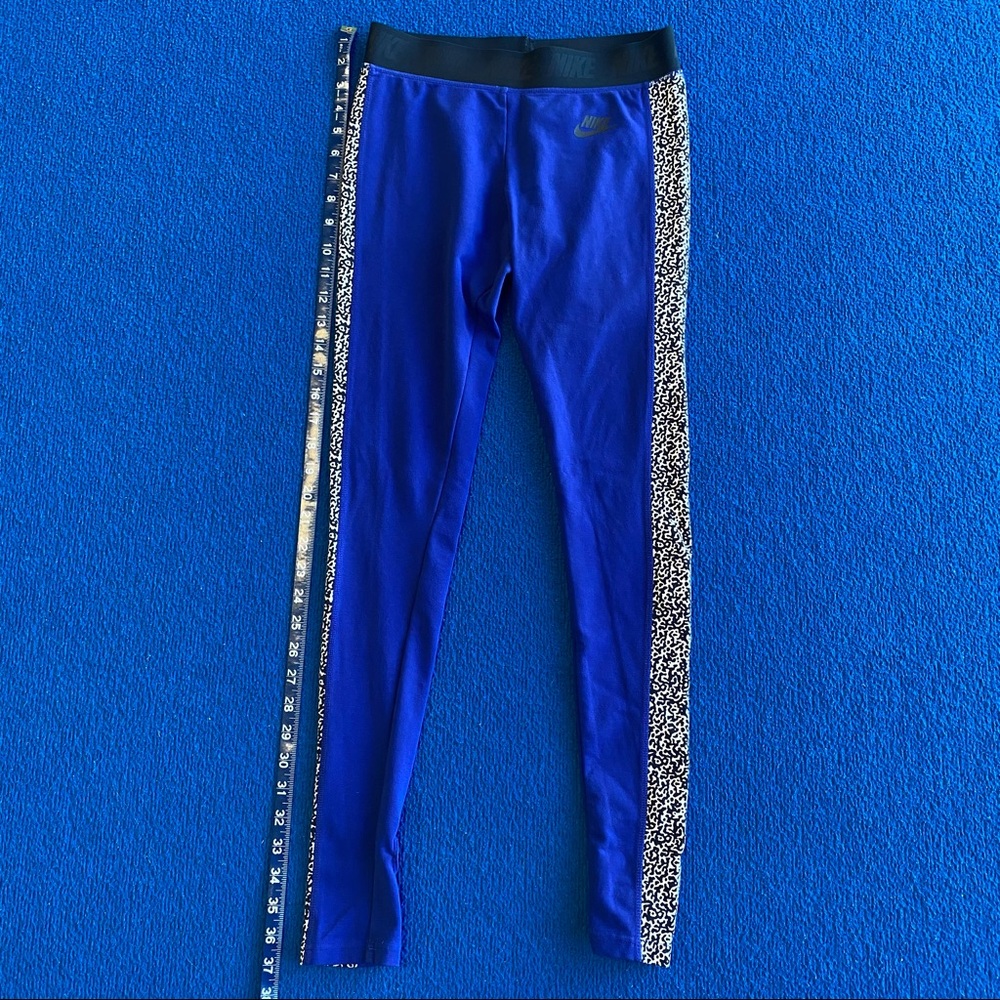 Nike in royal blue with side cheetah panel